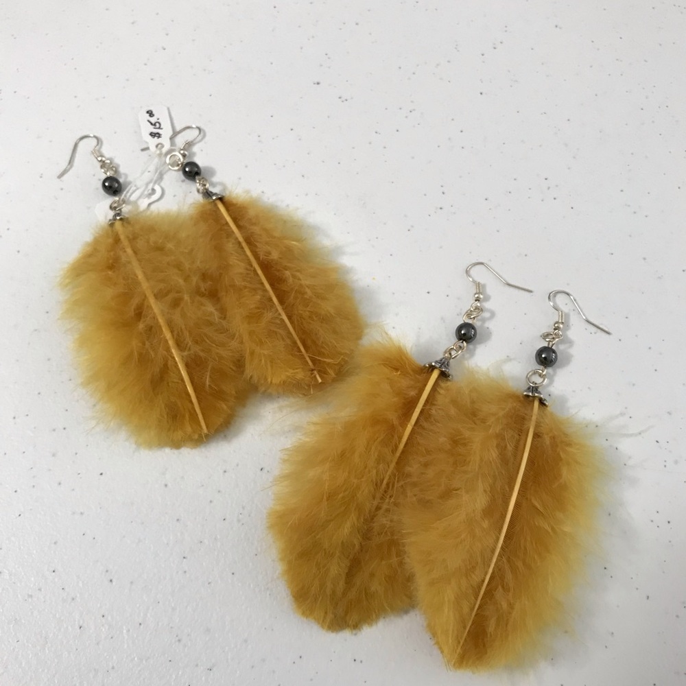 Mustard yellow feather earrings
